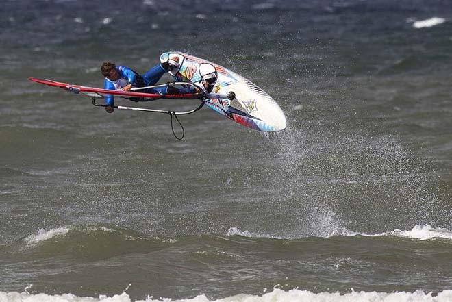 Robby Swift busts out the air chacho - 2012 PWA Cold Hawaii World Cup ©  John Carter / PWA http://www.pwaworldtour.com